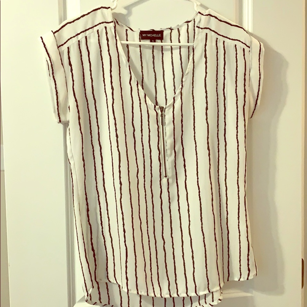 Cute black and white blouse.